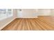 Spacious living area with sleek hardwood flooring, ample natural light, and a modern, clean aesthetic at 381 Warner Se, Marietta, GA 30060