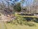 Aerial view of a backyard with trees and other vegetation at 610 Amberwood Pl, Euharlee, GA 30145