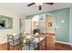 Bright dining area features stylish furniture and natural light, creating a perfect space for Gathering meals and entertaining at 610 Amberwood Pl, Euharlee, GA 30145