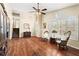 Open living area featuring hardwood floors, natural light and arched doorway for a modern, flowing layout at 610 Amberwood Pl, Euharlee, GA 30145