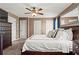 Large primary bedroom with neutral carpeting and ample closet space at 610 Amberwood Pl, Euharlee, GA 30145