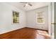 Bright bedroom featuring hardwood floors and natural light streaming through the windows at 1833 Ridgeland Dr, Decatur, GA 30032