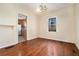 Inviting dining area with hardwood floors and a view of the kitchen at 1833 Ridgeland Dr, Decatur, GA 30032