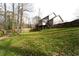 Spacious backyard with a large deck and a wooden fence at 5166 Ridge Tarn, Acworth, GA 30102