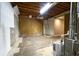 Unfinished basement with exposed ceiling, wooden beams, and concrete flooring at 5166 Ridge Tarn, Acworth, GA 30102