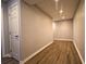 Finished basement with hardwood floors and recessed lighting at 5166 Ridge Tarn, Acworth, GA 30102