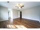 Spacious bedroom with hardwood floors, ceiling fan, and neutral paint throughout at 5166 Ridge Tarn, Acworth, GA 30102