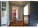 Hallway featuring hardwood floors, with access to a bathroom and bedroom at 5166 Ridge Tarn, Acworth, GA 30102