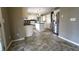 View of kitchen with island, stainless steel refrigerator, and tiled floor at 5166 Ridge Tarn, Acworth, GA 30102