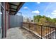 Outdoor balcony featuring metal railings and neighborhood views at 5200 Peachtree Rd # 3403, Atlanta, GA 30341