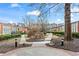 Charming courtyard featuring manicured landscaping and inviting walkways, complemented by classic brick architecture at 5200 Peachtree Rd # 3403, Atlanta, GA 30341