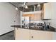 Modern kitchen with stainless steel appliances and a breakfast bar at 5200 Peachtree Rd # 3403, Atlanta, GA 30341