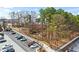 Convenient parking lot view featuring multiple cars, green space and building at 5200 Peachtree Rd # 3403, Atlanta, GA 30341