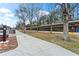 Scenic rail trail view with signage, landscaping, and pathway at 5200 Peachtree Rd # 3403, Atlanta, GA 30341