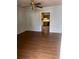 Living room with laminate flooring and a view into the kitchen at 1033 Mclendon Dr, Decatur, GA 30033