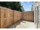 Private fenced-in backyard with a concrete patio, perfect for outdoor entertaining at 162 Springbottom Dr, Lawrenceville, GA 30046