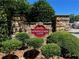 Elegant stone sign marking the entrance to Springlake Cove Condominiums at 162 Springbottom Dr, Lawrenceville, GA 30046