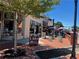 Charming sidewalk café with outdoor seating, brick sidewalk, and a view of the street at 162 Springbottom Dr, Lawrenceville, GA 30046