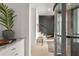 Elegant hallway featuring a unique glass elevator, modern decor, and stylish lighting at 380 2Nd St, Fayetteville, GA 30214