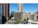 An aerial view of downtown buildings and skyscrapers in the city's financial district at 620 Peachtree Ne St # 1806, Atlanta, GA 30308