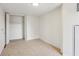 Cozy bedroom featuring carpeted floors and closet space for optimal storage at 620 Peachtree Ne St # 1806, Atlanta, GA 30308