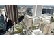 A panoramic city view showcases a mix of modern high-rises and traditional architecture at 620 Peachtree Ne St # 1806, Atlanta, GA 30308