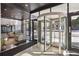 Modern lobby with a revolving door, comfortable seating, and natural light creating an inviting first impression at 620 Peachtree Ne St # 1806, Atlanta, GA 30308