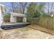 Image of a backyard shed with a wood deck and brick paver patio at 1631 Dresden Ne Dr, Brookhaven, GA 30319