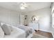 Bedroom featuring hardwood floors, ceiling fan and a closet at 1631 Dresden Ne Dr, Brookhaven, GA 30319