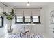 Bright home office with natural light, a simple white desk, and modern decor at 1631 Dresden Ne Dr, Brookhaven, GA 30319
