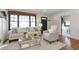 Cozy living room showcasing hardwood floors and comfortable seating arrangements at 1631 Dresden Ne Dr, Brookhaven, GA 30319