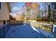 View of back deck and fenced backyard with mature trees at 175 Jayne Ellen Way, Alpharetta, GA 30009