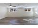 Spacious basement with vinyl plank flooring, recessed lighting and bright window views at 175 Jayne Ellen Way, Alpharetta, GA 30009