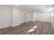 Expansive basement with vinyl floors, recessed lights, ceiling fan and a neutral color scheme at 175 Jayne Ellen Way, Alpharetta, GA 30009