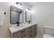 Stylish bathroom features dual sinks with quartz countertops and modern fixtures at 175 Jayne Ellen Way, Alpharetta, GA 30009
