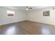 This bedroom has hardwood floors and two windows providing great natural light at 175 Jayne Ellen Way, Alpharetta, GA 30009