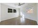 Bright bedroom with hardwood floors, white walls and natural light from two windows at 175 Jayne Ellen Way, Alpharetta, GA 30009