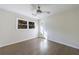 This bedroom has fresh paint, hardwood floors, and a large window that provides great natural light at 175 Jayne Ellen Way, Alpharetta, GA 30009