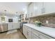 Beautifully renovated kitchen with stainless steel appliances, ample counter space, and modern cabinetry at 175 Jayne Ellen Way, Alpharetta, GA 30009
