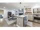 Spacious and updated living area with a fireplace, kitchen, and dining area at 175 Jayne Ellen Way, Alpharetta, GA 30009