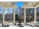 Elegant balcony showcasing its pillars, railings, fire pit, and verdant natural scenery at 510 Covington Cv, Alpharetta, GA 30022