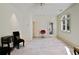 Bright bonus room with natural light, neutral colors, and versatile space at 510 Covington Cv, Alpharetta, GA 30022