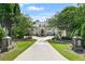 Long driveway with landscaping leading up to the home at 510 Covington Cv, Alpharetta, GA 30022