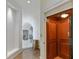 Hallway with elevator featuring wood-paneled interior and access to upper floors at 510 Covington Cv, Alpharetta, GA 30022