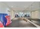 A large exercise room with mirrored walls and rubber flooring, perfect for fitness activities at 510 Covington Cv, Alpharetta, GA 30022