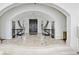 Spacious foyer with dual staircase and unique architectural details at 510 Covington Cv, Alpharetta, GA 30022