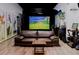 Golf simulator room featuring a large viewing screen and comfortable seating at 510 Covington Cv, Alpharetta, GA 30022
