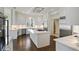 Bright kitchen with white countertops, large island, and stainless steel appliances at 510 Covington Cv, Alpharetta, GA 30022