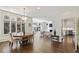 Open living area with hardwood floors, bay windows, and modern furniture at 510 Covington Cv, Alpharetta, GA 30022