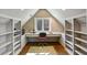 Bright office space with custom built-in shelves and drawers with a view to the trees at 510 Covington Cv, Alpharetta, GA 30022
